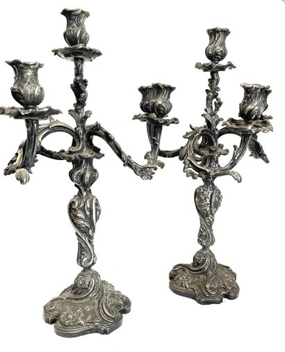 null Pair of three-light metal CANDELABRES with chased foliage decoration, Rocaille...