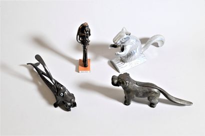 null Four metal nutcrackers featuring a squirrel, crocodile, dog and monkey. England...