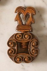 null Small boxwood pinion breaker, with flat scalloped cage carved with keystones....