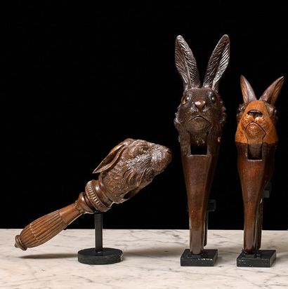 null Three wooden nutcrackers of various species featuring rabbit heads, two with...