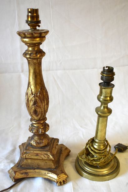 null Carved giltwood LAMP STAND (Height 37 cm). ADDED: brass CANDLE-HOLDER mounted...