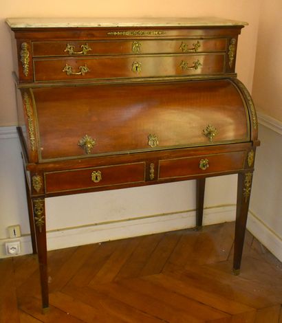 null Mahogany cylinder desk, white marble top (stained), bronze ornaments. Louis...