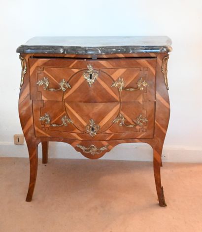 null Rosewood veneered SMALL COMMODE with curved front and sides, opening to two...