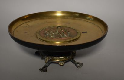 null BARBEDIENNE Fondeur: Brass CUP on four feet adorned with a copper medallion...