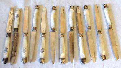 null TWELVE FRUIT KNIVES, mother-of-pearl DG handles, silver blades (one tip missing)....