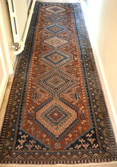 null TWO Caucasus RUGS (wear): gallery rug with seven motifs (Length 295 - Width...