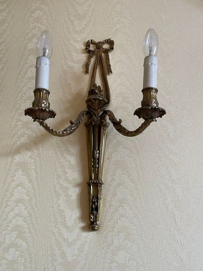 null Pair of Louis XVI style two-light bronze APPLIQUES. Height: 47 cm