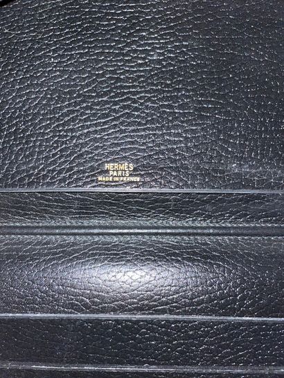 null HERMES: SACOCHE and two wallets in black leather (worn).