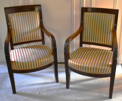 null Pair of mahogany armchairs (one back missing), red striped fabric upholstery....