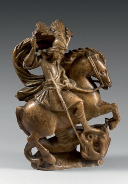 null Statuette en albâtre d'un saint Georges à cheval terrassant le dragon. XVIIe...