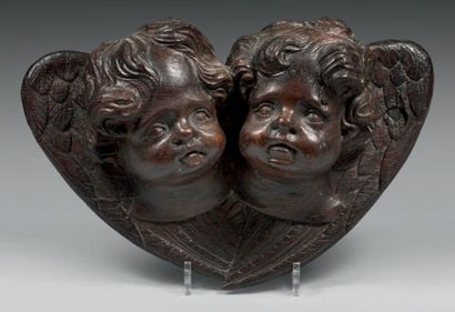 null Deux têtes d'angelots en chêne sculpté. Époque Louis XIV.
Haut. 24 - Larg. 41...