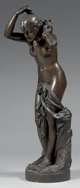 Jean-Baptiste BAUJAULT (1828-1899) 
Jeune fille à sa toilette
Bronze patine médaille....
