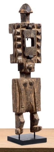 Mali, bambara 
Serrure d'une porte de case en bois à patine d'usage, sculpté d'une...