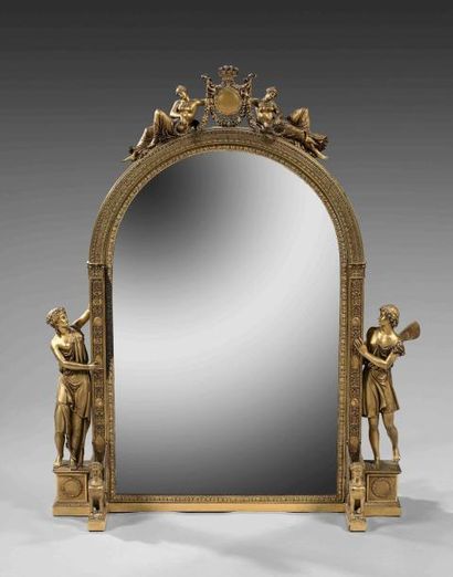 Important miroir psyché cintré en bronze...
