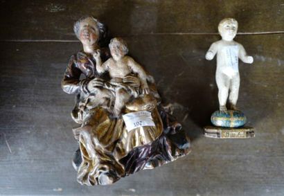 null Vierge à l'Enfant baroque en bois doré et peint.

Haut. 22 cm

Joint : Statuette...