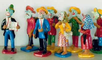Silvano RODRIGES Huit poupées en terre cuite peinte à l'huile figurant un groupe...