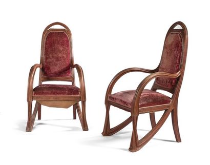 null Louis MAJORELLE (1859-1926) : Deux fauteuils en noyer mouluré et sculpté à haut...