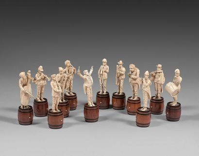 null L'Orchestre des Gueux. Douze statuettes en ivoire figurant des musiciens debout...