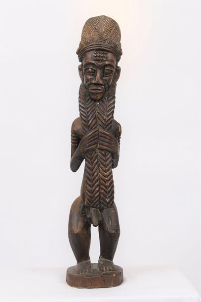 null Wooden figurine

Former Belgian Congo before 1960

Dimensions: H: 69; W: 14...