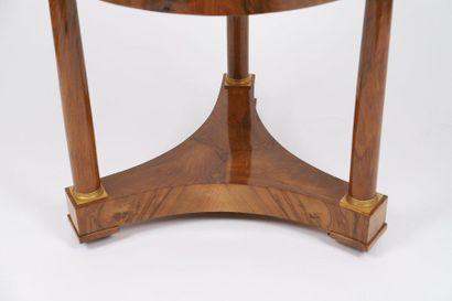 null Empire pedestal table with secret 

Round, in mahogany veneer and grey Saint-Anne...