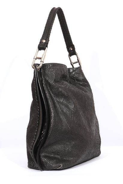 null Studio Pollini

Black leather bag immitation snake.

Condition of use

Dimensions:...