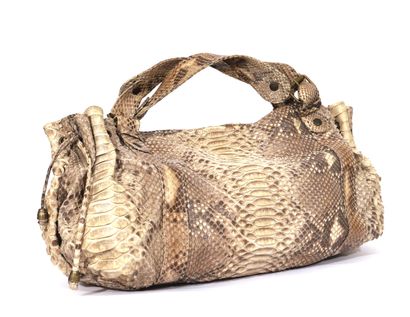 null Gérard Darel 

Handbag model "Le H24

In beige leather with snake imitation

Condition...