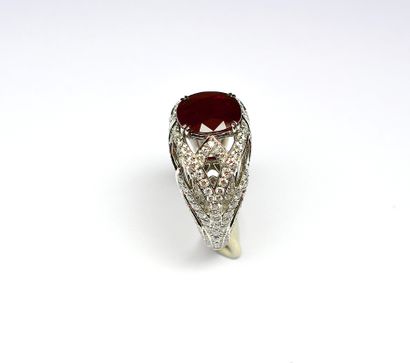 Ring 

White gold centered with a deep red...