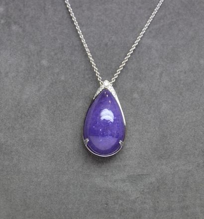 null Pendant 

White gold centered with a large Natural Tanzanite drop cabochon weighing...