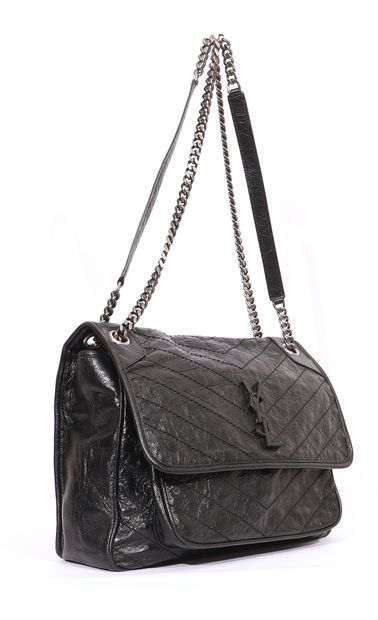 null Yves Saint Laurent - Niki medium

Black leather bag with Saint Laurent monogram...
