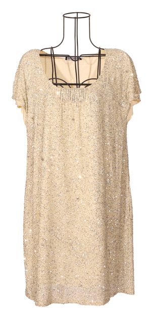 null Twin set

Short beige dress with sequins

Good condition

Size: L