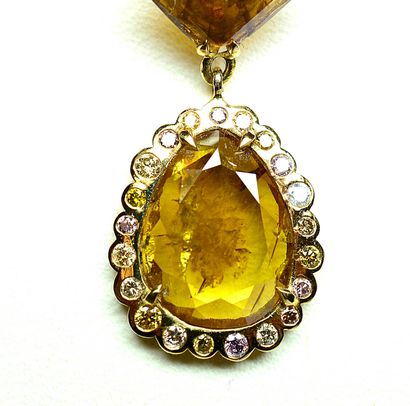 null Pendant 

Yellow gold with a square diamond and a faceted drop diamond weighing...