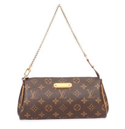 null Louis Vuitton by Marc Jacobs

Small monogrammed canvas clutch, natural leather,...