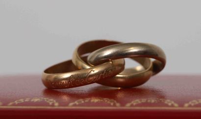 null Alliance Trinity de Cartier 
Triple anneau en Or jaune, rose et blanc 
Signée
Poids:...