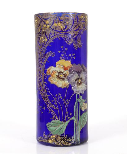 null LEGRAS Théodore (1839/1916) France 
Vase rouleau en verre bleu à décor émaillé...