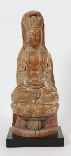 null BUDDHA CHINOIS

En bois sculpté et patiné représentant un buddha assis sur un...