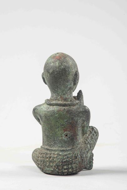 null Bronze « PERSONNAGE ASSIS » 

IFE NIGERIA 1700 Circa 		

Dimensions: H: 14 ...