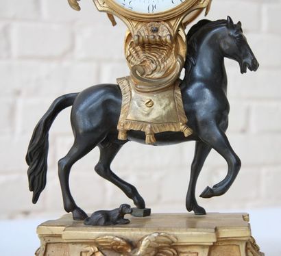null Importante pendule "au cheval" Louis XVI

En bronze doré et patiné figurant...