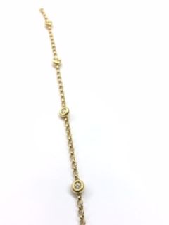 null Gourmette 

Or Jaune 18 K, avec diamants 5 pierres de 0.05 cts chacune.