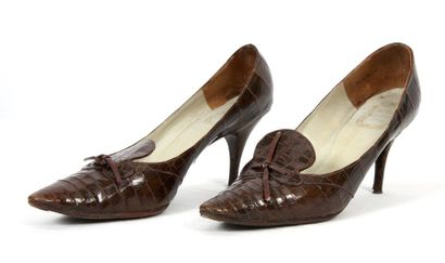 null Chaussures Dior

En peau de crocodile marron. Hauteur de talon: 6 cm

Epoque...