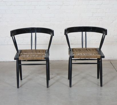 null Ensemble de deux fauteuils "grass-seated" dans le goût de George Nakashima (1905-1990)

Dining...