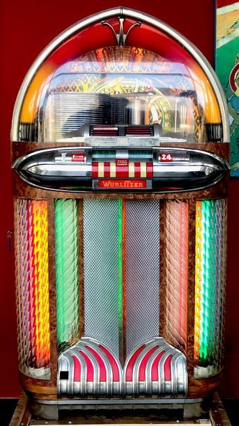 null Jukebox Wurlitzer

Modèle 1100 - Année 1948

En bakélite coloré, cylindre rotatifs...
