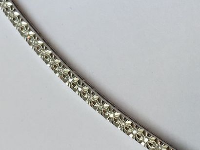 null Bracelet tennis 

Etoile Or blanc 18k, 70 diamants pour 0.29 cts. Model italien.

8,64...