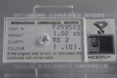 null DIAMANT de 1,02ct sous blister, taille brillant, G VS2, avec certificat de l’International...