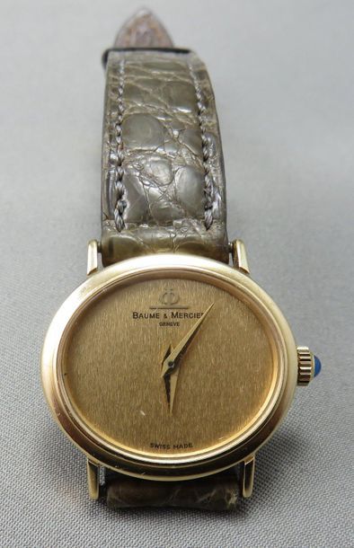 null Baume & Mercier Genève

 Montre Bracelet de Dame

 en or à 750°/00, de forme...