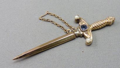 null Epingle de Cravate "Epée"

 en or à 750°/00, stylisant une épée et son fourreau,...