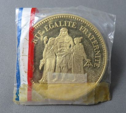null Monnaie de Paris - Piéfort 1974 

Pièce Piéfort en or à 920°/00 de 50 Francs...