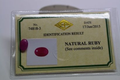 null Oval BIRMAN RUBBIS on paper weighing 2.94 cts. The ruby is accompanied by its...