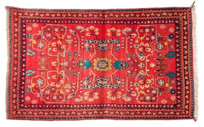 null Original MAHAL SAROUK with brick red field with geometric floral decoration...