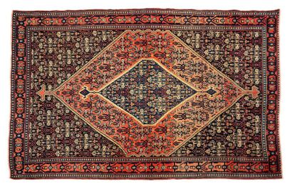 null End SENNEH with night blue field with Herati motifs decorated with two intertwined...