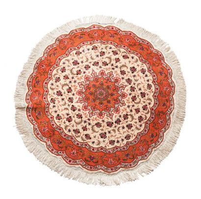 null Thin TABRIZ of round shape with ivory field with garlands of silk flowers surrounded...